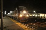 NJT 4011 heads west after stop.